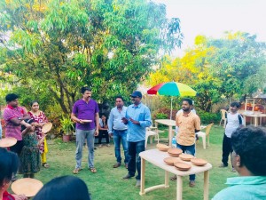 NATURE FIRST ECO VILLAGE CEO P V HIREMATH DISTRIBUTING BIRD FEEDERS AND WATER BOWLS TO VISITORS FREE OF COST (5)